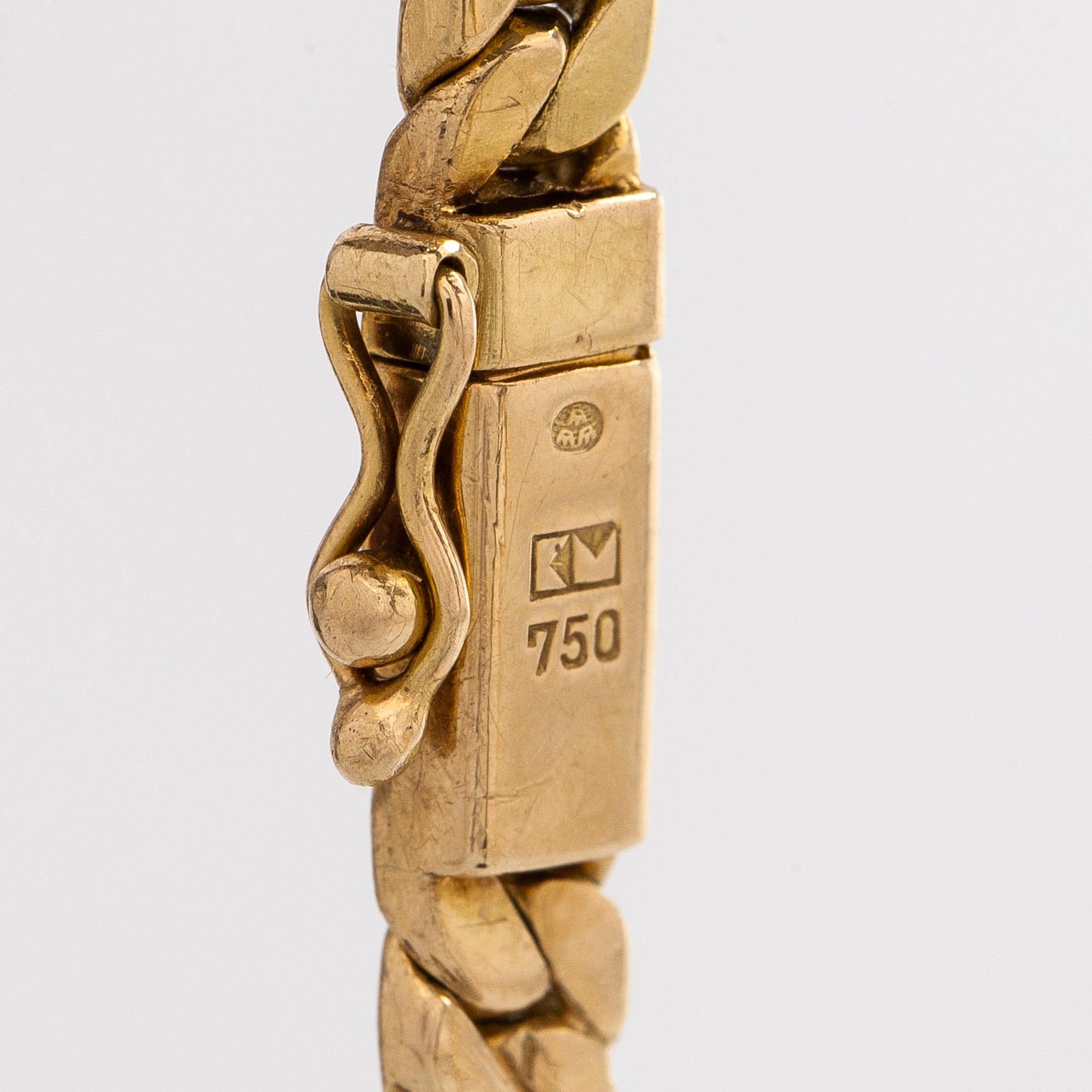 Collier, 18K guld och en briljantslipad diamant.