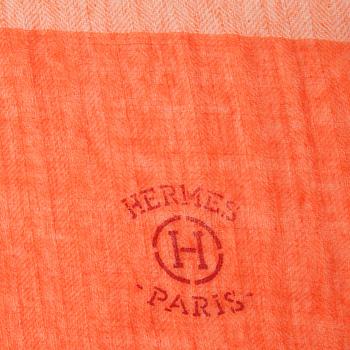 HERMÈS, a orange cashmere and wool shawl.