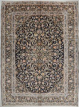 A Keshan rug, 410 x 300 cm.