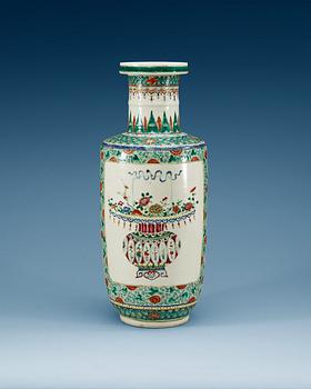 1479. A famille rose vase, Qing dynasty with Kangxis six character mark.