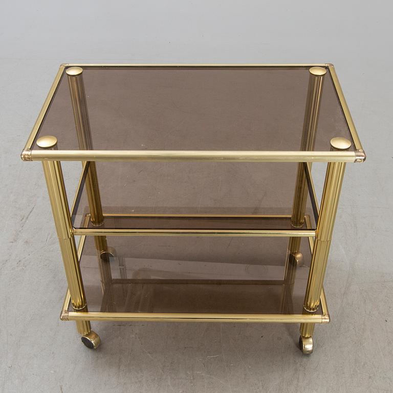 A brass serving trolley later part of the 20th century.