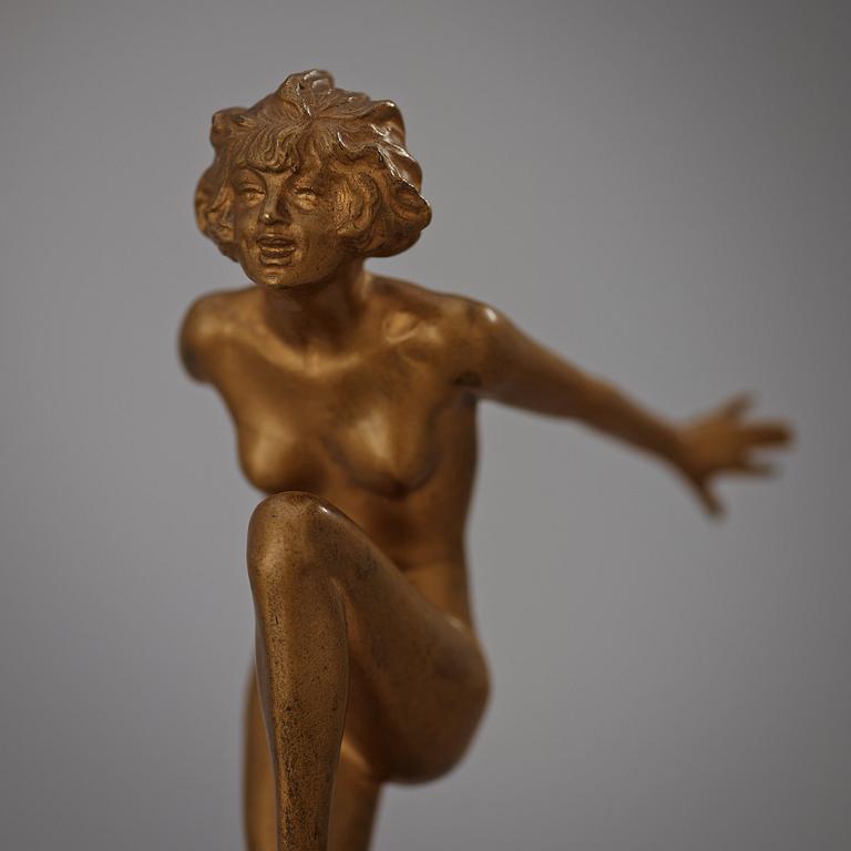 A Josef Lorenzl Art Déco gilt bronze sculpture of a nude dancer, Austria.