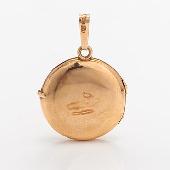 A 14K gold locket. Kulta-tiimi, Turku 1995.