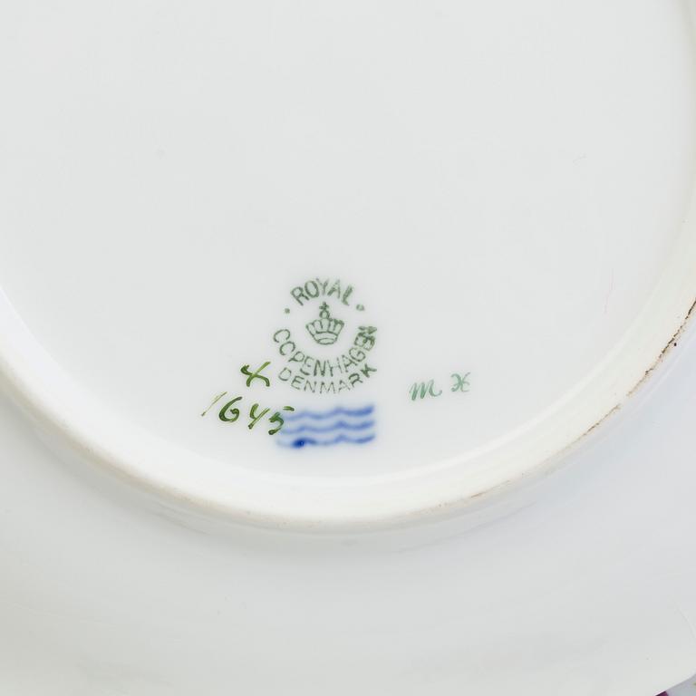 15 small porcelain plates from Royal Copenhagen, Denmark.