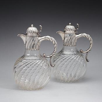 A pair of Swedish 19th century silver and glas jugs, marks of K. Andersson, Stockholm 1893.