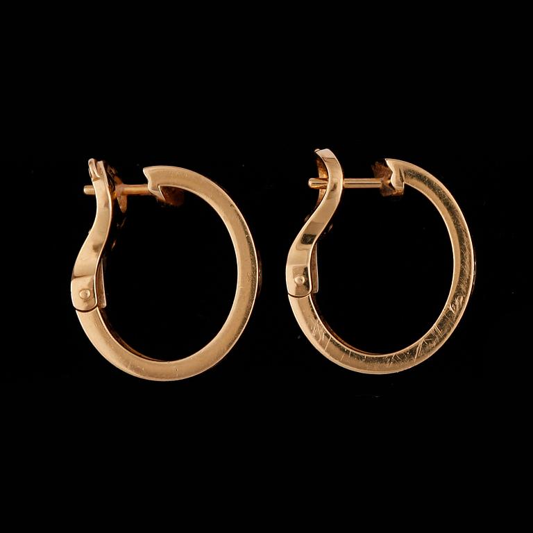 ÖRHÄNGEN, Cartier 'Love earrings' med briljantslipade diamanter totalt ca 0.10 ct.