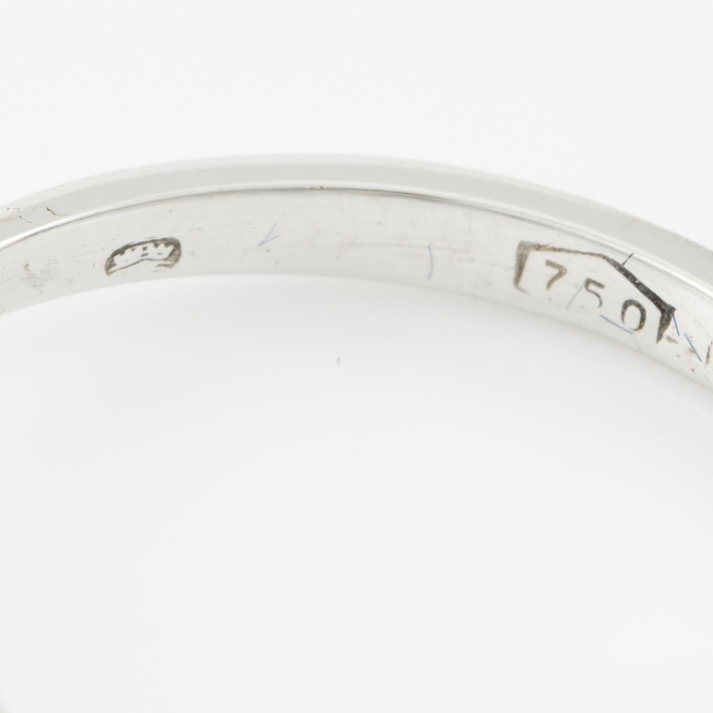 Ring in 18K white gold set with sapphires and brilliant-cut diamonds,.