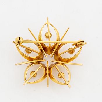 Two gold brooches with pearls.