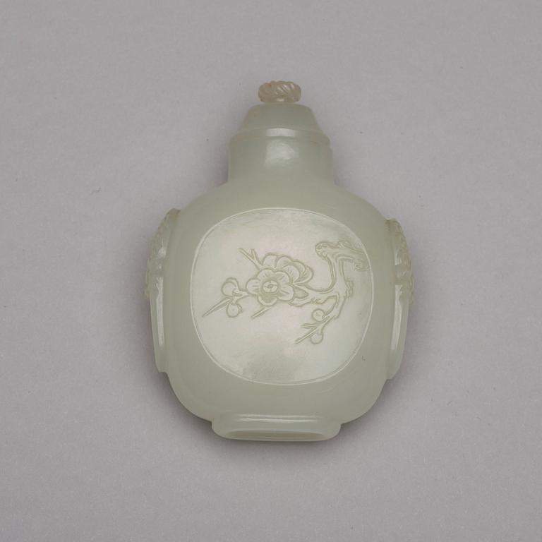 A Chinese nephrite snuff bottle, pendant and figurine.