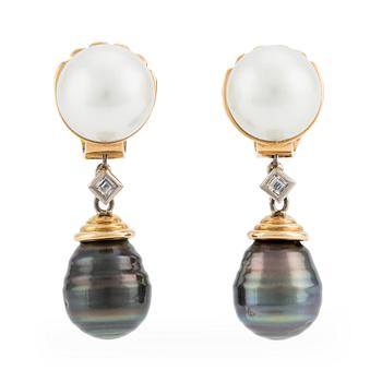 542. A pair of  18K gold Gaudy earrings with cultured South Sea and Tahiti pearls.