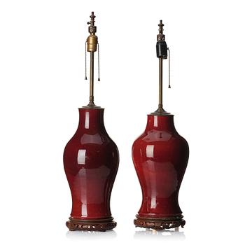 1287. A set of two flambé glazed table lamps/vases, Qing dynasty, 19th century.