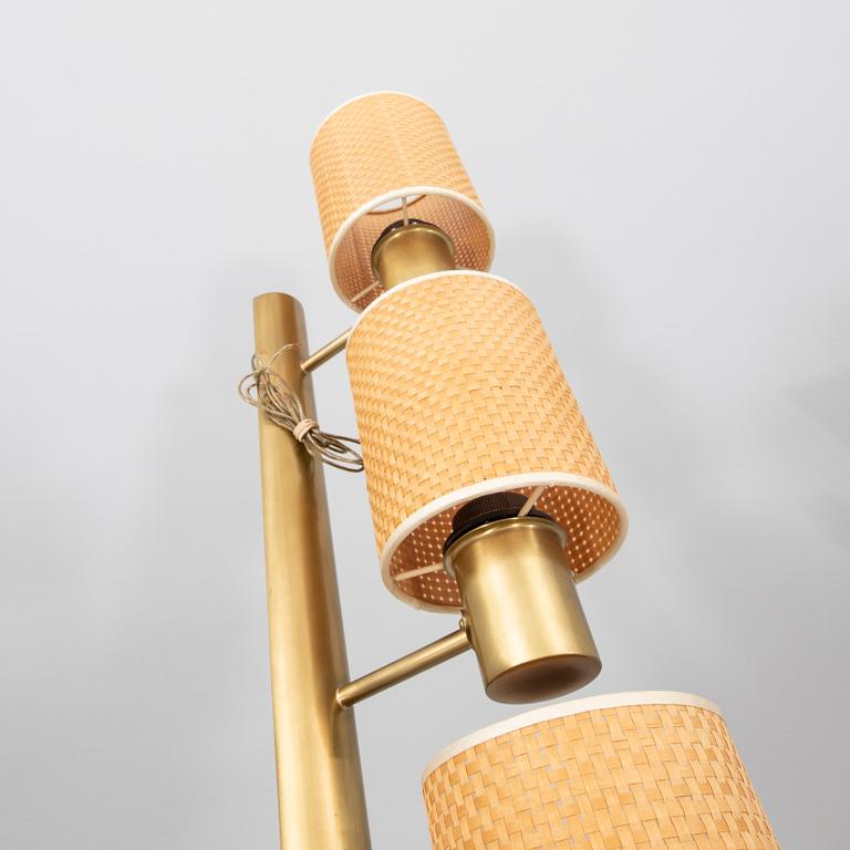 Hans-Agne Jakobsson, a brass wall lamp.