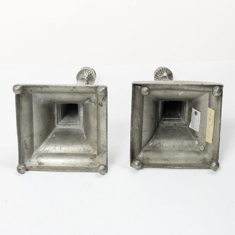 A pair of peuter candlesticks by Petter Höijer, Örebro (1796-1819).