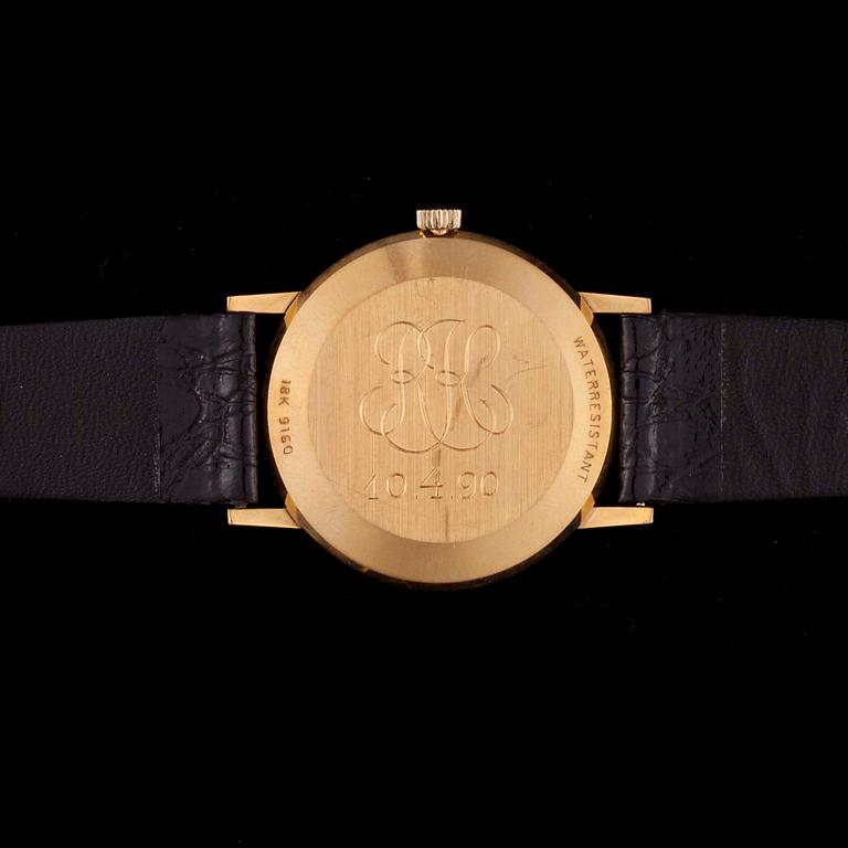 ARMBANDSUR, herr, Raymond Weil, 18K guld, läderarmband. Original etui. 1990-tal.
