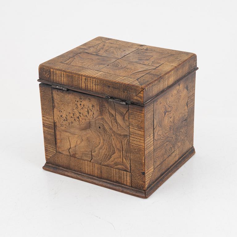 A Swedish rococo elm tea caddy, later part of the 18th century.