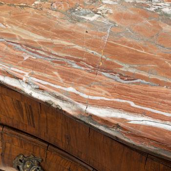 A 19th Century rococo style chest of drawers.