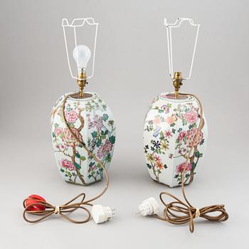 A pair of Chinese famille rose vases, turned into table lamps, 20th century.