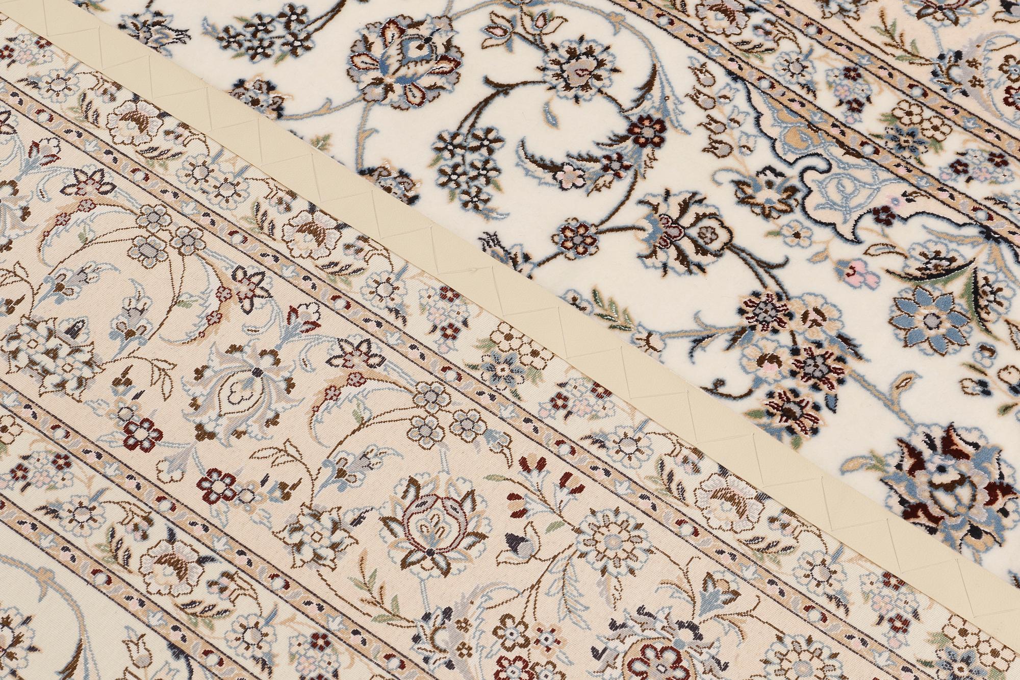 A carpet, Nain part silk s.k 6LAA, ca 310 X 209 cm.