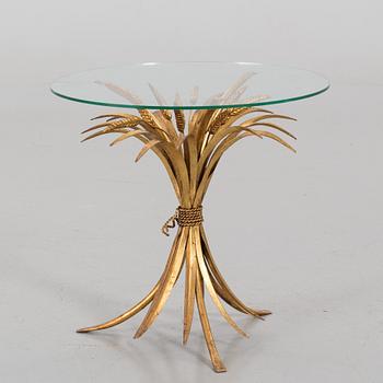 A HANS KÖGL ROUND GLAS AND GUILT METAL SMALL COFFEE TABLE.