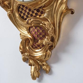 A Louis XV mid 18th century gilt bronze wall clock, "Chasse", in the style of J J de Saint Germain,