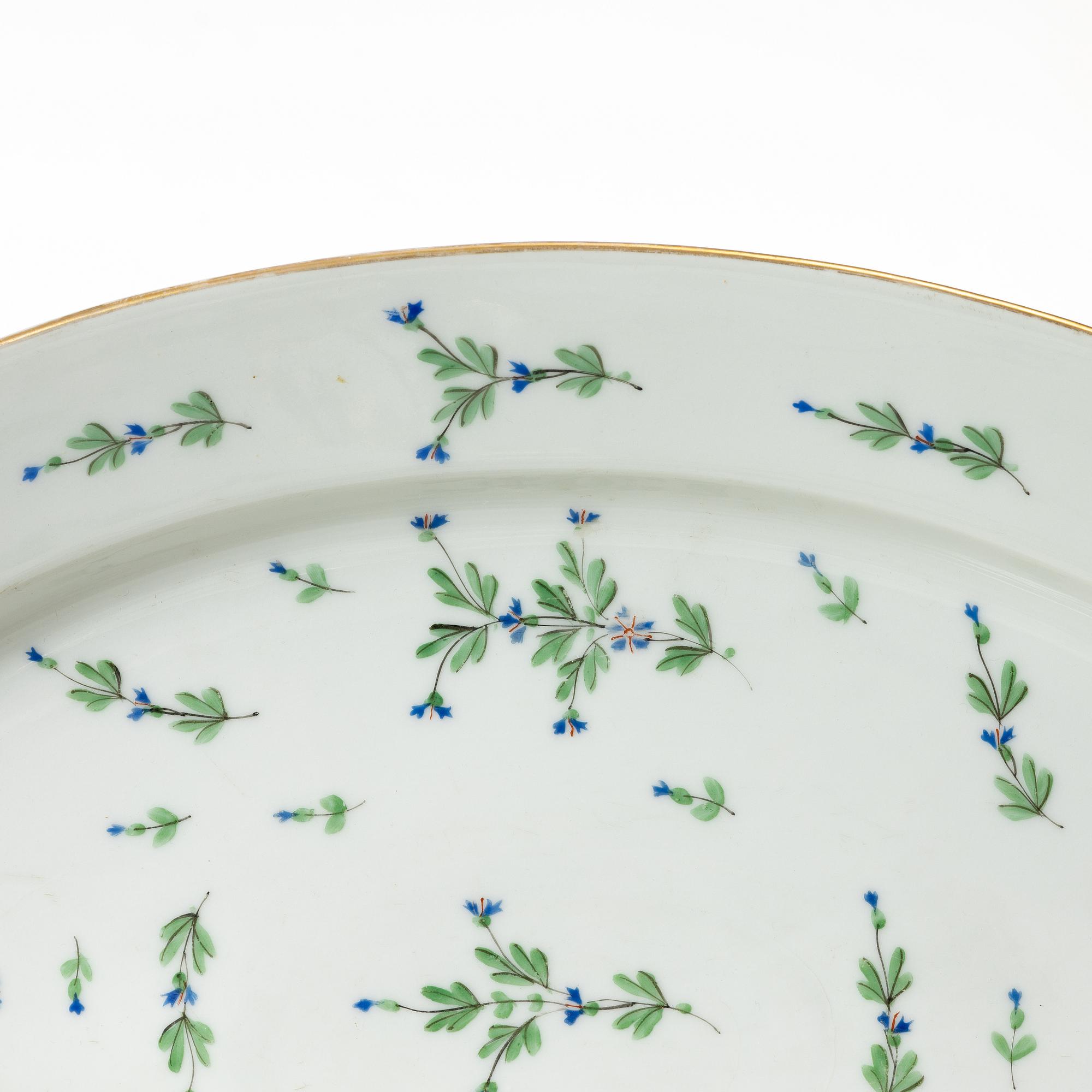 Five pieces of an Angoulême sprig pattern porcelain service, Pillivuyt & Cie, France, around 1900.