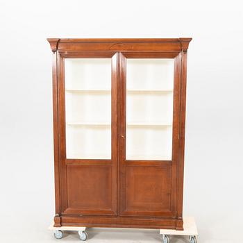 A walnut display cabinet later part of the 20th century.