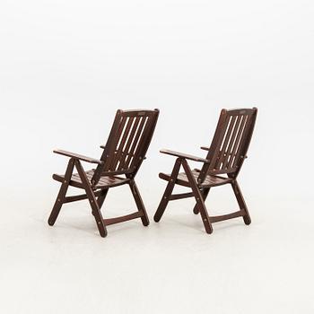 A set of five stained wood garden chairs from KWA around year 2000.