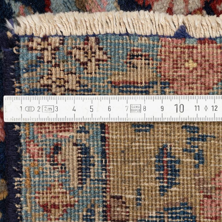 A rug, possibly Tabriz, c. 195 x 137 cm.