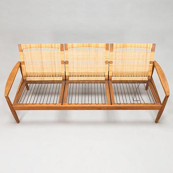 Hans Olsen, A teak and rattan sofa for Juul Kristensen, Denmark, late 1950s.