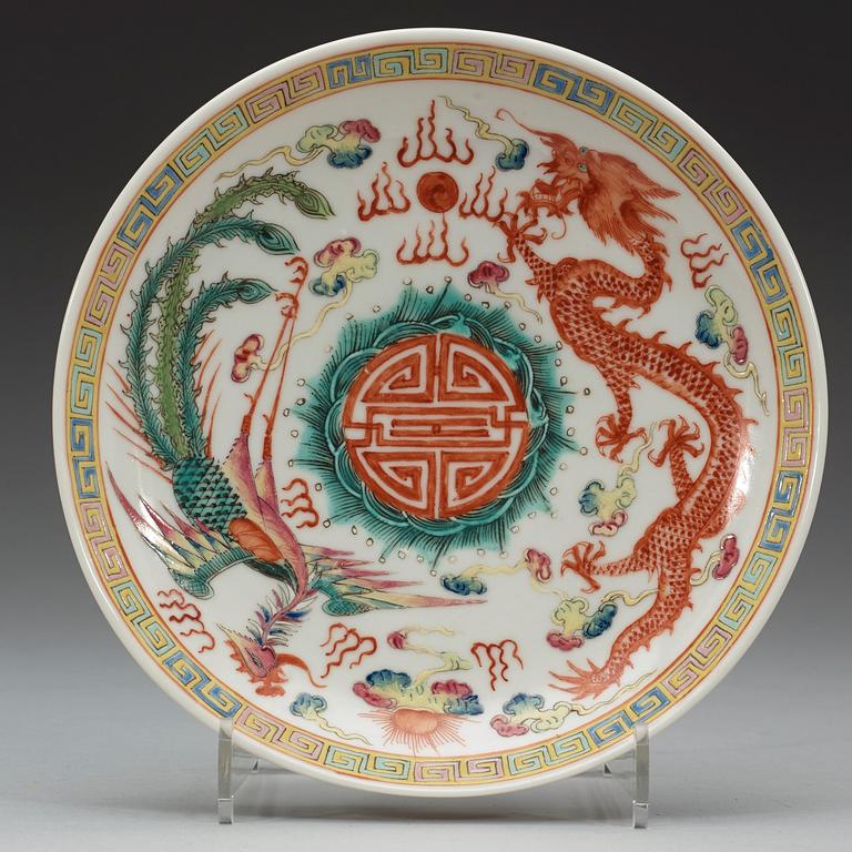 A set of three phoenix and dragon famille rose dish, Qing dynasty with Guangxu six character mark and period (1875-1908).