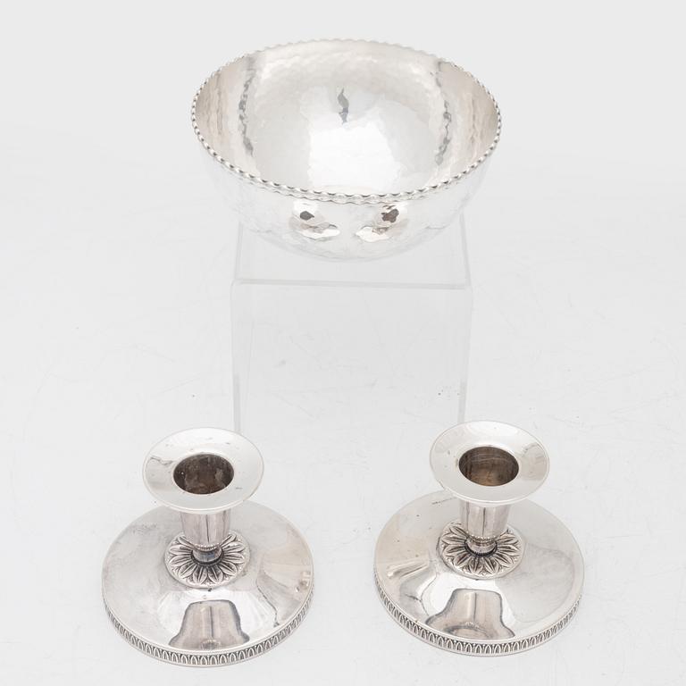 A pair of Swedish silver candlesticks, and a bowl, 1930s–60s.
