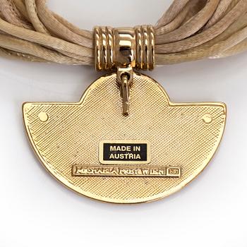 Michaela Frey, armband och halssmycke, förgylld metall, emalj.