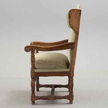 A 18th century baroque armchair.