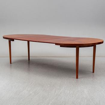 a mahogany dining table from the mid 20th century.