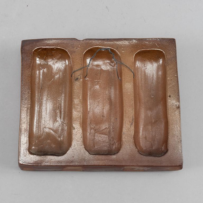 Two stoneware wall reliefs by Åke Holm.