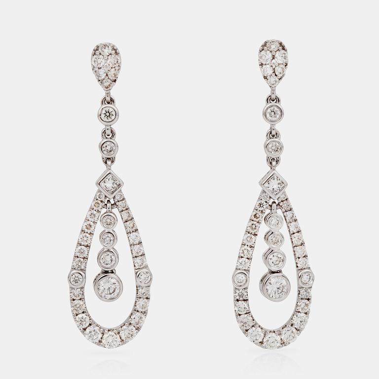 A pair of diamond earrings, 1.58 cts in total.
