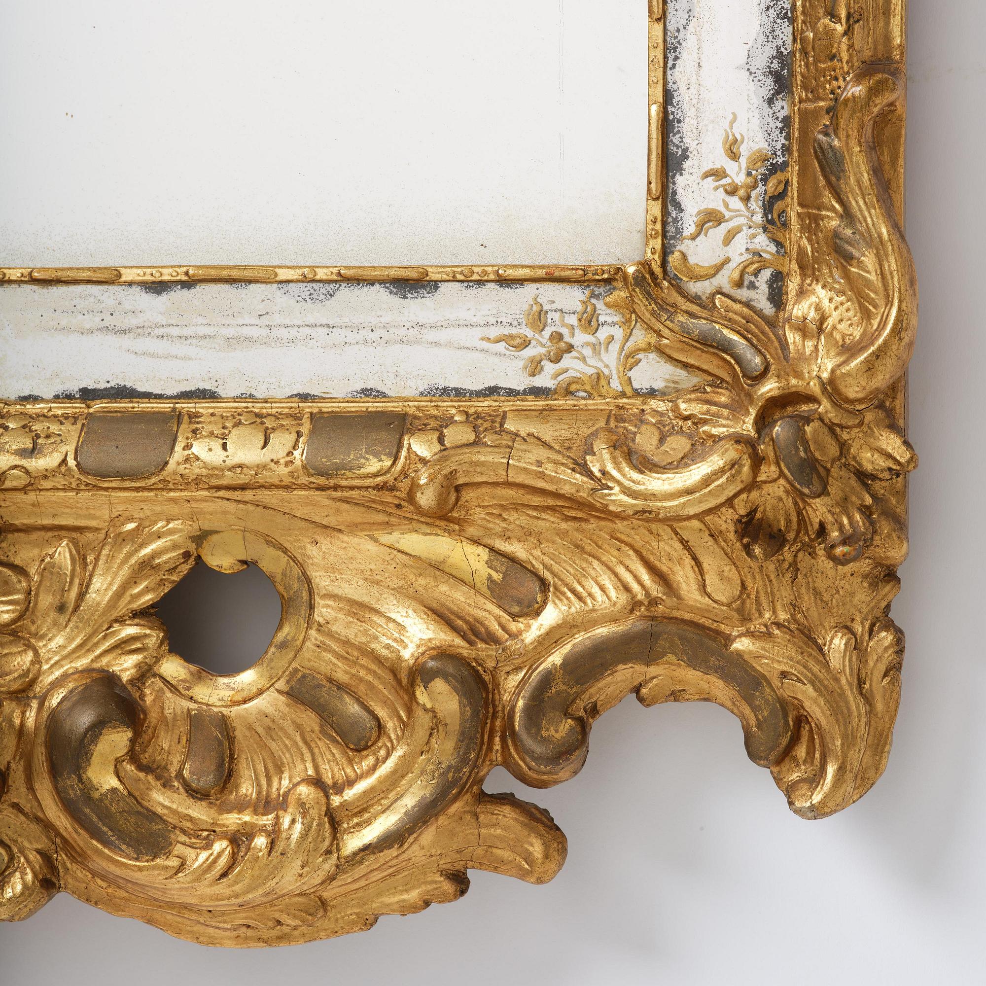 A giltwood rococo mirror, Stockholm, later part 18th century.