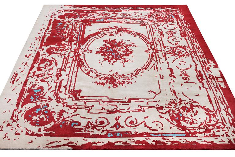 An oriental carpet, c. 300 x 248 cm.