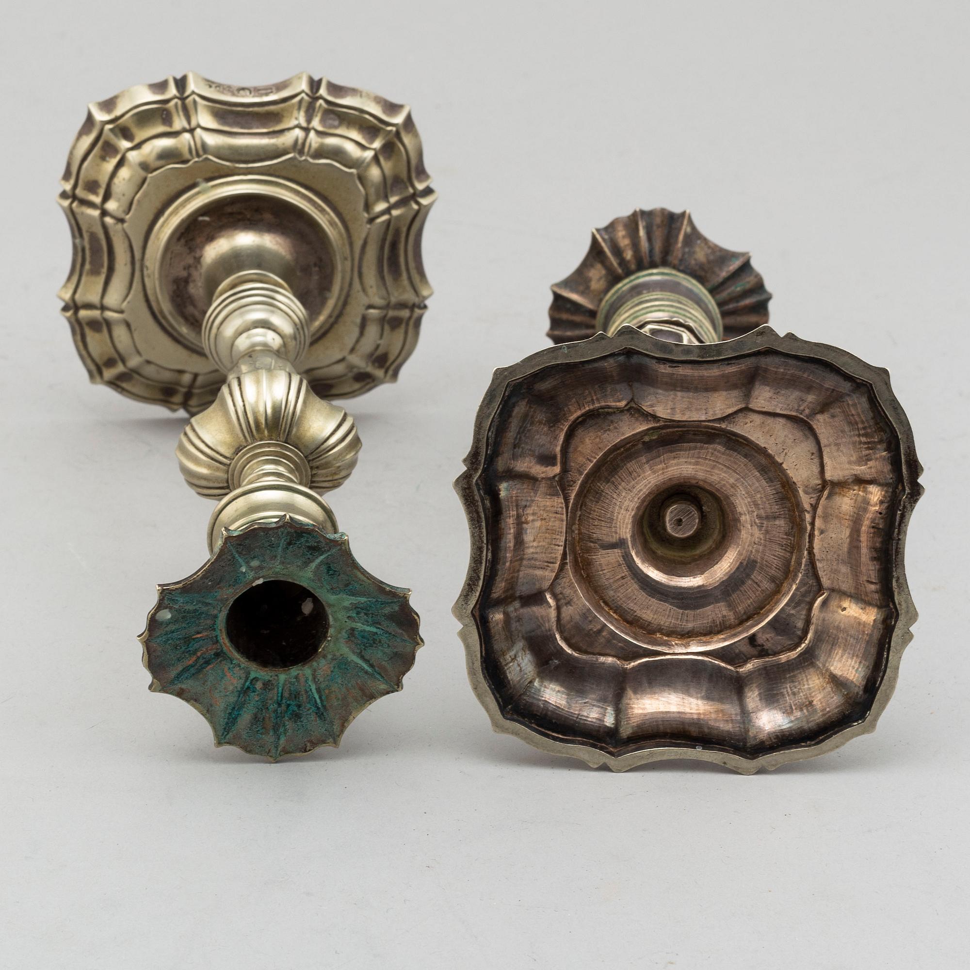 A pair of paktong candlesticks, second half of the 18th century.