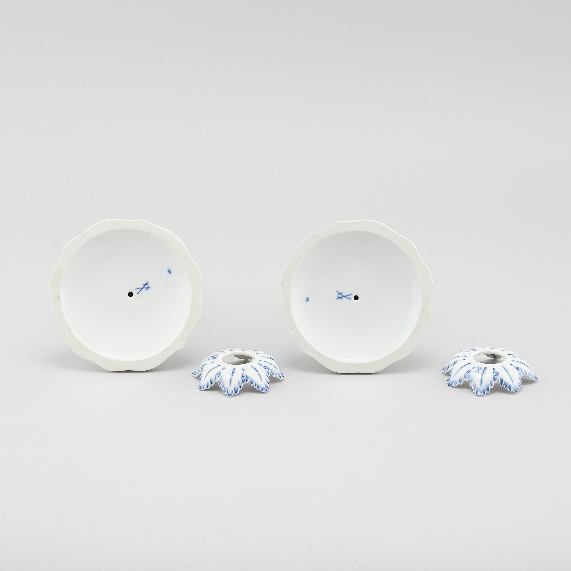A pair of porcelain candle sticks by Meissen, second half of the 20th century.