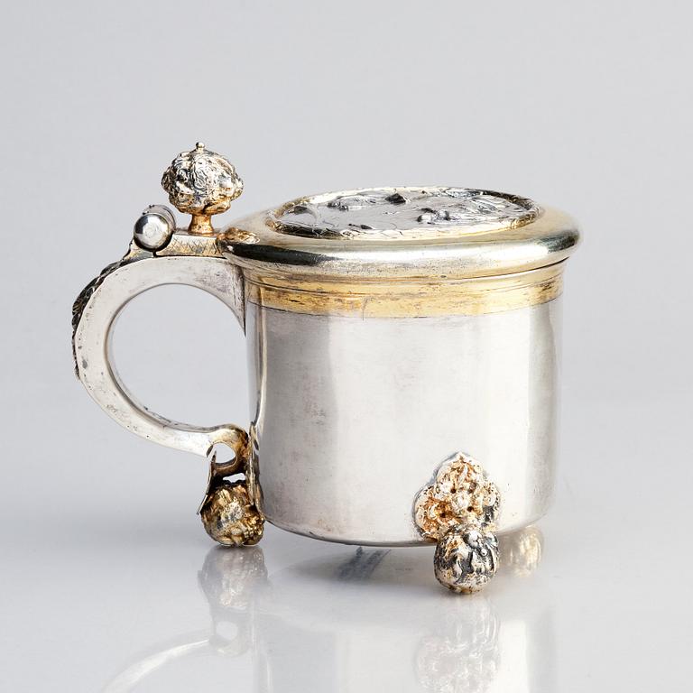 A Swedish parcel-gilt silver tankard, mark of Erik Månsson Schmidt, Stockholm (active 1675-1686).