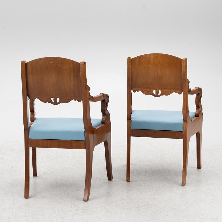 A pair of Baltic late Empire mahogany open armchairs, ca 1840.