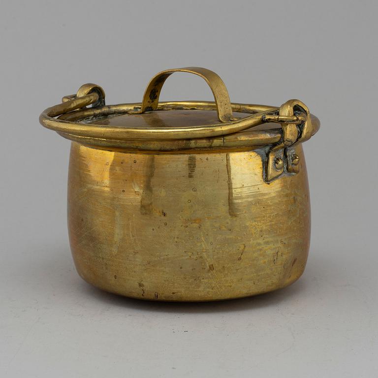 A 19th century brass saucepan.