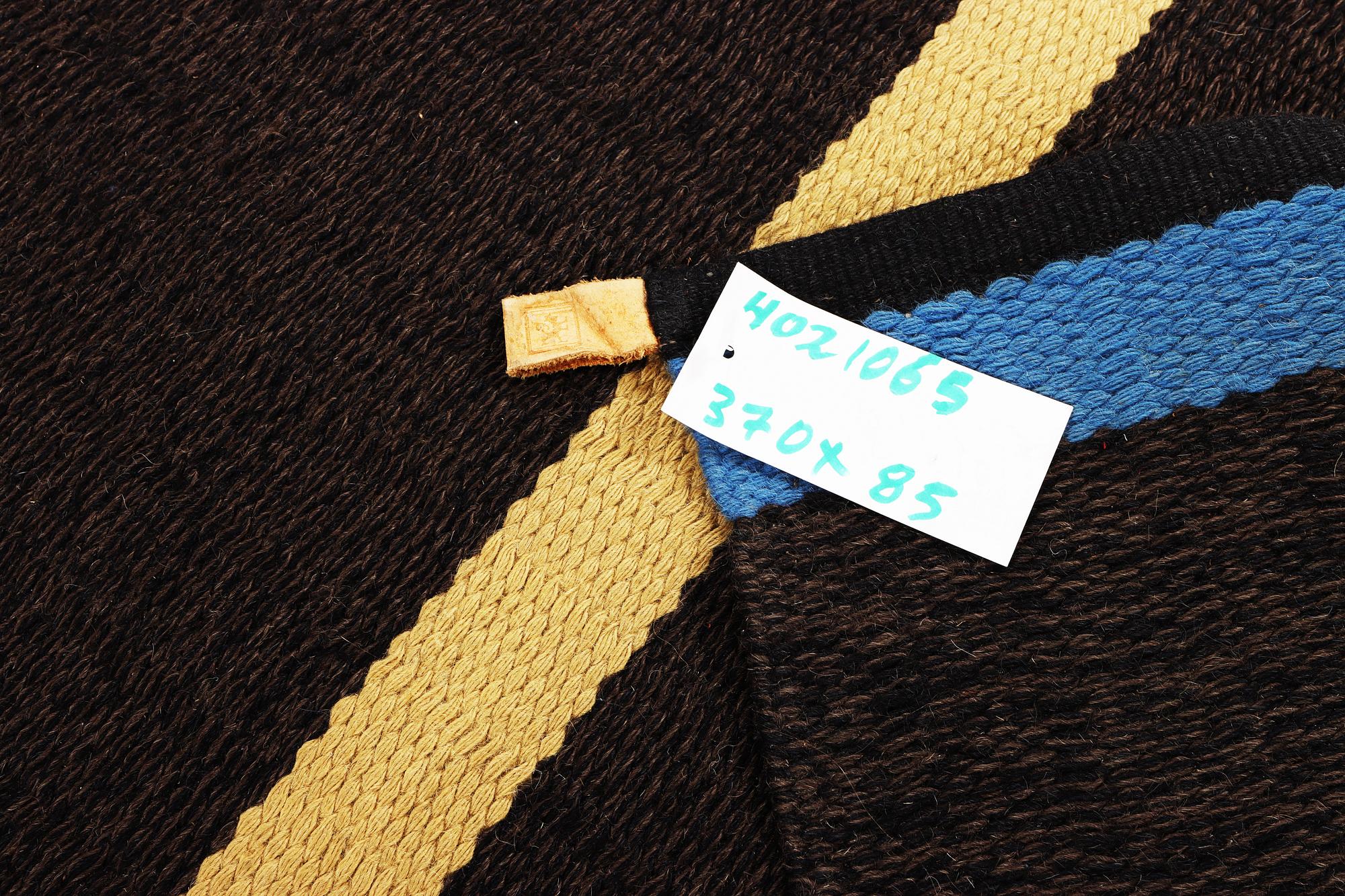 A runner carpet, Kasthall, c. 370 x 85 cm.