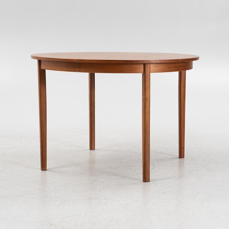 A teak dining table, second part of the 20th Century.