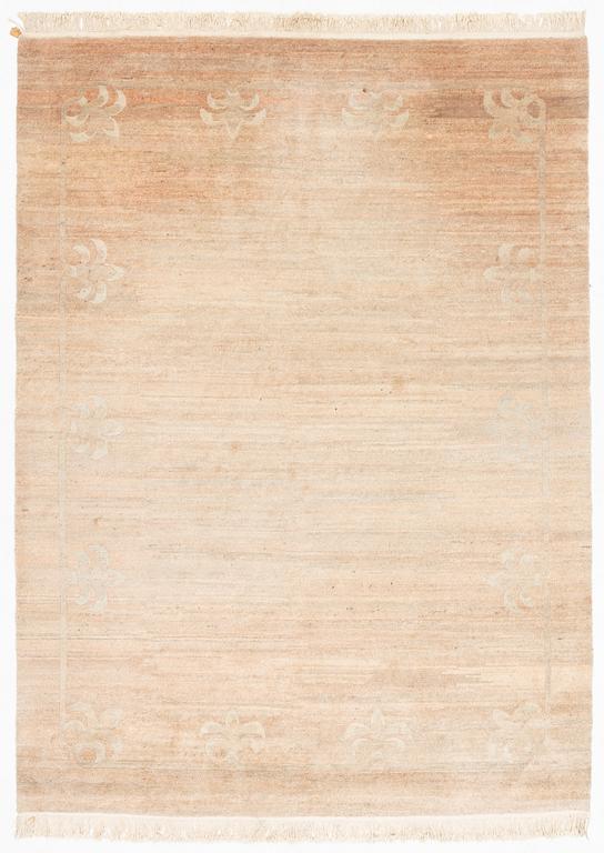 A Chinese carpet, c. 330 x 270 cm.