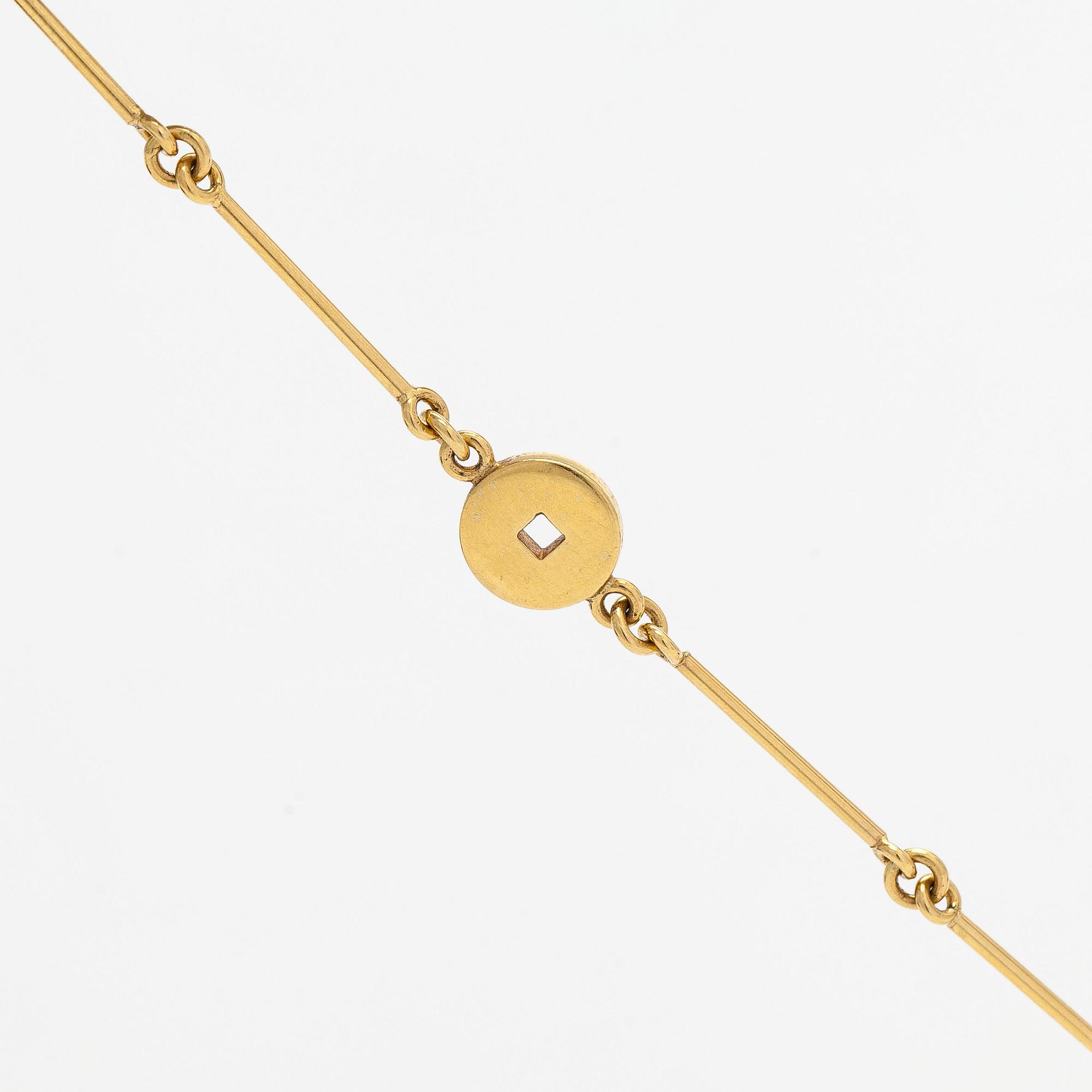 Pendant, faceted sapphires, rubies and diamonds, iron ore, 18K gold and white gold.