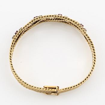 Armband 18K guld med rosa safirer och briljantslipade diamanter.