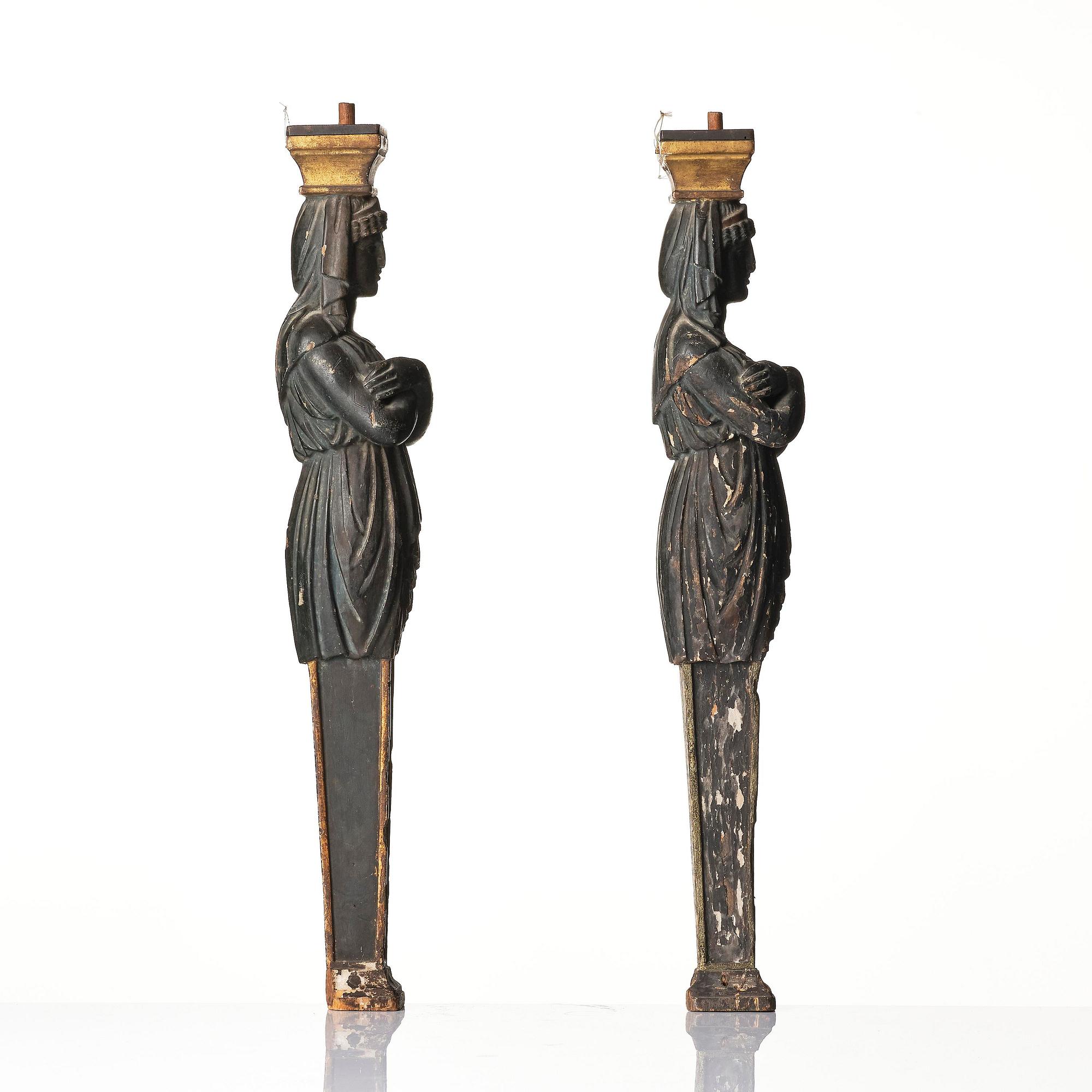 A pair of late Gustavian carved caryatids in the manner of Pehr Ljung (1743-1819) and Ernst Philip Thomann (1760-1833).