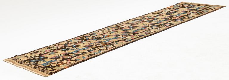 A bench cushion, tapestry weave, c. 245 x 57 cm, Östra district, Blekinge, Sweden, mid 19th century.